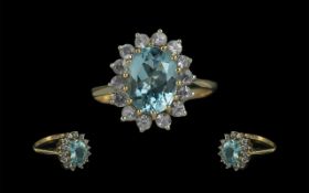 Ladies 9ct Gold Diamond and Aquamarine Set Cluster Ring. Marked 9ct.