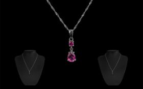 9ct Gold Double Drop Pink Topaz Pendant, in white gold.