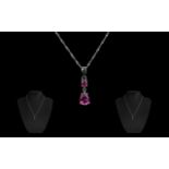 9ct Gold Double Drop Pink Topaz Pendant, in white gold.