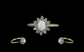 Ladies 9ct Gold Attractive Opal and Diamond Set Cluster Ring. Full Hallmark to Interior of Shank.