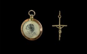 9ct Gold Crucifix, approx 1" long, together with an antique locket with two pictures, unmarked.
