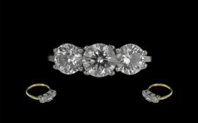 18ct Gold Three Stone Diamond Ring, set with three round cut diamonds.