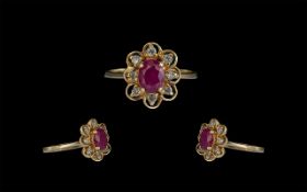 18ct Gold Attractive Ruby and Diamond Set Cluster Ring. Marked 18ct to Interior of Shank. The Ruby