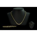 18ct Gold Diamond Set Necklace. Marked 750 - 18ct.