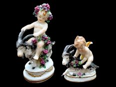 Pair of Chelsea Figurines, depicting cherubs riding on goats. Largest measures approx.