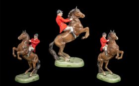 Beswick Hand Painted 'Huntsman' on Rearing Horse, 1st version, model no. 868, designed by A.