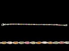 Colours of Tourmaline Tennis Bracelet, oval cut tourmalines in the beautiful, rich, naturally warm