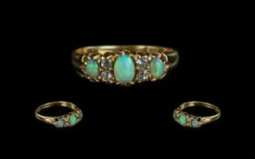 18ct Gold Antique Opal & Diamond Ring, three oval Opals with four round cut diamond spacers,