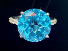 Swiss Blue Topaz Statement Ring, a 12.5ct round cut solitaire topaz of the rich, bright shade