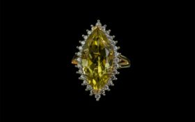 Green Gold Quartz Halo Ring, an 8ct marquise cut green gold quartz,