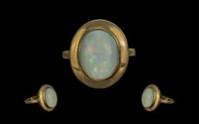 9ct Gold Attractive Single Stone Opal Set Ring. Marked 9ct to Shank.