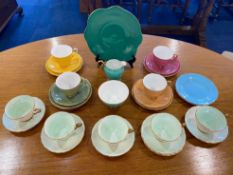 Collection of Royal Stuart Spencer Stevenson Colourful Porcelain, comprising four cups, saucers,