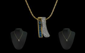 Ladies 14ct Gold Attractive Contemporary Design Sapphire and Diamond Set Necklace, marked 14ct =