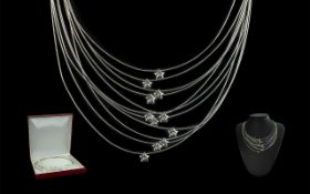 Ladies 18ct White Gold Contemporary Multi-Strand Necklace Set with 11 Moving Diamonds In a Star