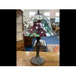 Tiffany Style Table Lamp, leaded shade on a bronzed column. Height Approx 26".
