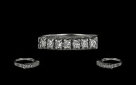 Ladies 18ct Gold Channel Set Seven Stone Diamond Set Ring. Marked 18ct to Interior of Shank.