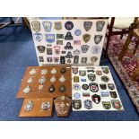Large Quantity of Police Badges, mounted on boards,