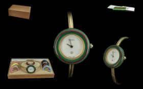 Gucci Ladies 12 Colour Variety Interchangeable Bezel Wristwatch in original Gucci display box,