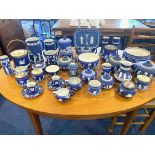 A Large Collection of Wedgwood Jasper Ware decorated in various classical scenes.
