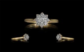 18ct Gold Attractive Diamond Set Cluster Ring, Flower head Design. Marked 18ct. Diamond Weight 0,