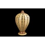 Beautiful Contemporary Hand Turned Wooden Table Lamp, when lit sends out a lovely pattern.