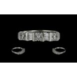 14ct White Gold Pleasing Quality Baguette and Brilliant Cut Diamonds Channel Set Ring.