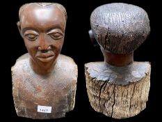 Carved Wooden African Bust, depicting the head and shoulders of a young man.