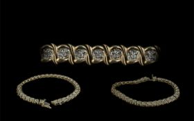 9ct Gold Diamond Tennis Bracelet, set with round cut diamonds, fully hallmarked. Length 8".