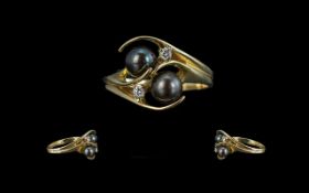 Ladies 14ct Gold Pleasing Black Pearl & Diamond Set Dress Ring, contemporary design, marked 14ct