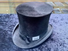 Gentleman's Top Hat made by Switzer & Company of Dublin. Black velour with black ribbon trim.