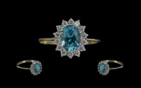 Ladies Attractive 9ct Gold Aquamarine and Diamond Set Cluster Ring.