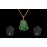 9ct Gold Mounted Jade Buddha Figure / Pendant Attached to a 9ct Gold Chain. Marked 9.375.