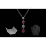 Edwardian Period - Excellent Platinum Ruby and Diamond Set Necklace with Four Stone Drop.