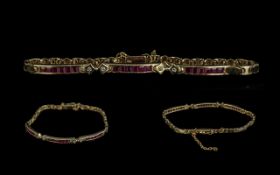 18ct Gold Attractive Good Quality Ruby Set Bracelet with Diamond Set Spacers. Marked 750 - 18ct.