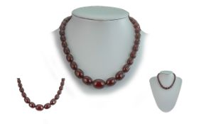 A Cherry Amber Beaded Necklace of Excellent Colour. c.1920's. 15 Inches - 37,5 cms long. Weight 22.