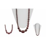 1920's Good Quality Cherry Amber Graduated Beaded Necklace of Long Length. Length 33 Inches.