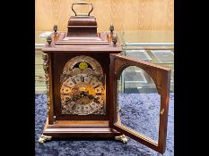 A Modern Reproduction Bracket Mantle Clock with Ormolu decoration, silvered dial,