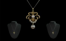 Antique Period Attractive 14ct Gold Open worked Pendant with Pearl Drop.