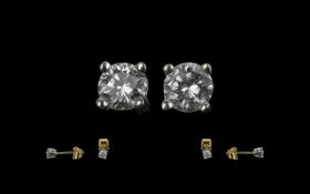 A Pair of 9ct Gold Diamond Set Studs, go