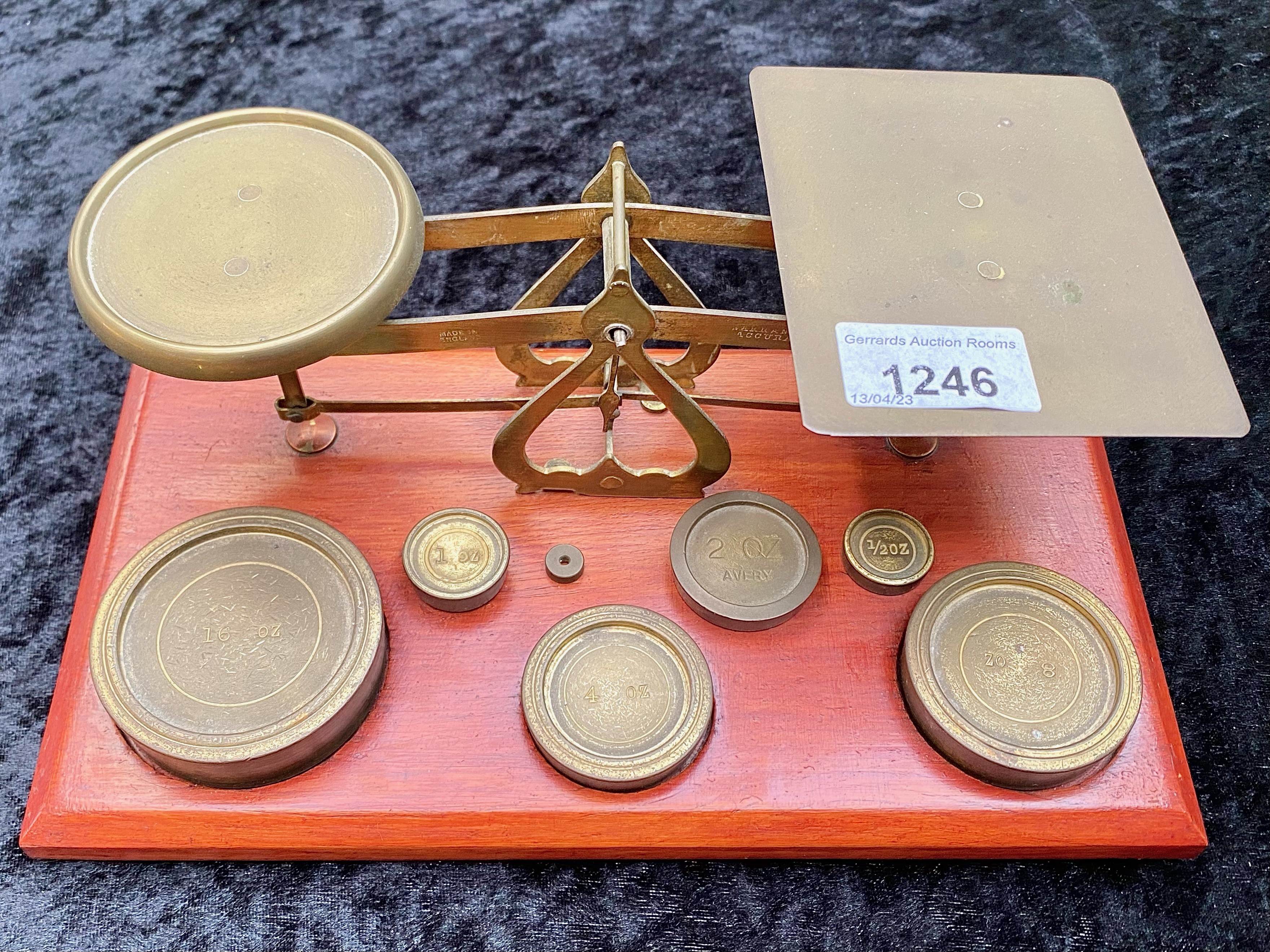 Set of Postal Scales, mounted on wooden base, with weights.