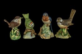 Five Spode Bird Figures, comprising American Robin, Barn Swallow, Firecrest, Long Billed Marsh Wren,