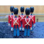 Five Wooden Soldiers, hand painted, 9" tall. Inside of each leg is the maker's name Kay Bojesen.