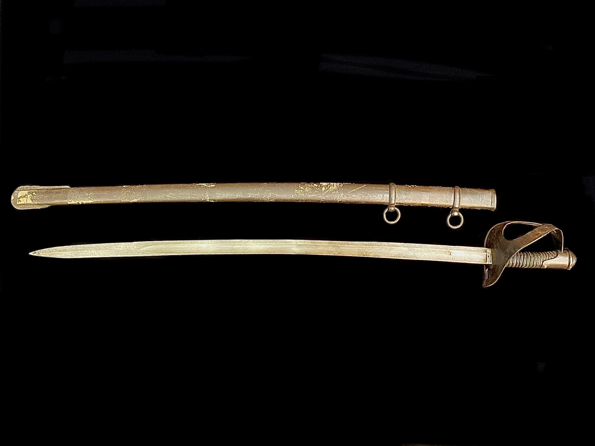 A 19th century Prussian Cavalry Trooper's Sword, having an 89cm curved fullered blade,