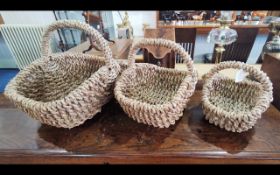 Three Graduated Traditional Wicker Baskets, largest 17" wide. Good condition.