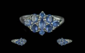 9ct White Gold Tanzanite Cluster Ring, fully hallmarked, ring size Q.