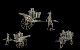 Oriental Cruet Set, novelty in the form of a man pulling a rickshaw, with salt,