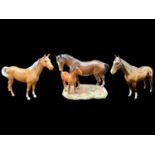 Beswick Palomino Horse Figure, facing right, swish tail and gloss finish, together with a Beswick