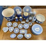 Box of Blue Jasper Wedgwood, comprising plates, biscuit barrel, planter, vases, lidded pots,