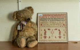 A Victorian Needlework Sampler, alphabet numbers and figures. Made by Mary Gasgarth Age 12, 1852.