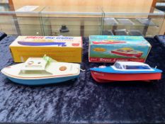 Two Vintage Boxed Speedboats, comprising a Sprite Day Cruiser Clockwork Boat by Sutcliffe,